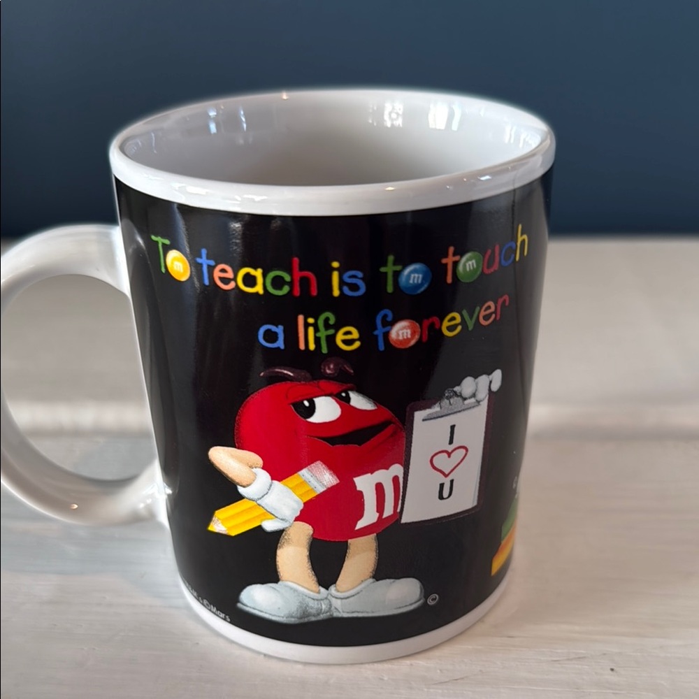 M&M's Black Mug with Colorful Design and Inspirational Teacher Message